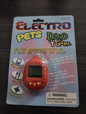VINTAGE ELECTRO PETS DINO GAME RED TAMAGOTCHI LIKE KNOCK OFF VIRTUAL PET TOY